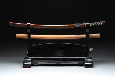 A collection of fine Japanese sword handles, guards, sheaths, a sword and a lacquered stand, Edo, 18/19th C.