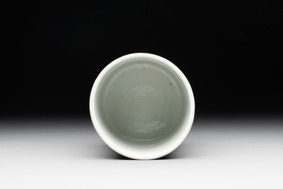 A Chinese black-glazed reverse-decorated 'poem' brush pot, 19th C.