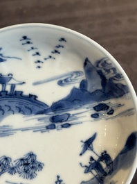 Four Chinese blue and white 'landscape' cups and saucers, Kangxi