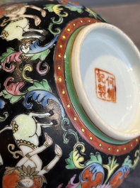 A rare Chinese black-ground Bencharong 'Thepphanom' bowl and cover for the Thai market, He Yaoji 何耀記 mark, 19th C.