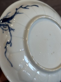 Four Chinese blue and white 'landscape' cups and saucers, Kangxi