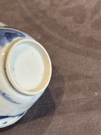 Four Chinese blue and white 'landscape' cups and saucers, Kangxi