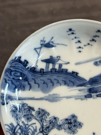 Four Chinese blue and white 'landscape' cups and saucers, Kangxi