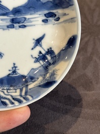 Four Chinese blue and white 'landscape' cups and saucers, Kangxi