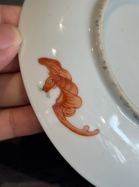 A Chinese iron-red 'bat' saucer and a black-glazed 'ship' saucer with calligraphy, Guangxu mark, 19th C.