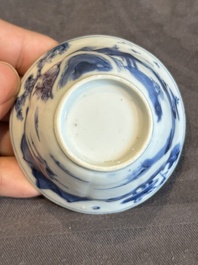 Four Chinese blue and white 'landscape' cups and saucers, Kangxi
