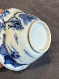 Four Chinese blue and white 'landscape' cups and saucers, Kangxi