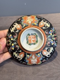 A rare Chinese black-ground Bencharong 'Thepphanom' bowl and cover for the Thai market, He Yaoji 何耀記 mark, 19th C.