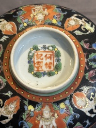 A rare Chinese black-ground Bencharong 'Thepphanom' bowl and cover for the Thai market, He Yaoji 何耀記 mark, 19th C.
