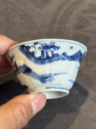 Four Chinese blue and white 'landscape' cups and saucers, Kangxi