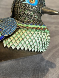 A Chinese precious stone inset, enamelled and filigree silver mandarin duck-form box and cover, 19/20th C.