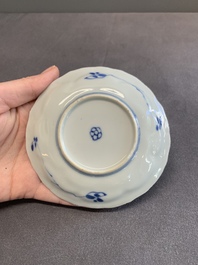 Twelve Chinese blue and white saucers and eight cups, Kangxi/Yongzheng