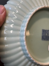 A Chinese celadon-glazed chrysanthemum-shaped plate, Qianlong mark, 20th C.
