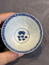 Five Chinese blue and white cups and saucers with floral design, Yu 玉 mark, Kangxi