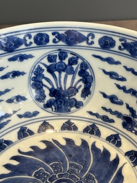 A Chinese powder blue-ground biscuit, blue and white 'Buddhist lion' bowl, Xuande mark, Kangxi
