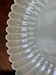 A Chinese celadon-glazed chrysanthemum-shaped plate, Qianlong mark, 20th C.