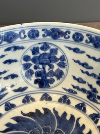 A Chinese powder blue-ground biscuit, blue and white 'Buddhist lion' bowl, Xuande mark, Kangxi