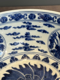 A Chinese powder blue-ground biscuit, blue and white 'Buddhist lion' bowl, Xuande mark, Kangxi
