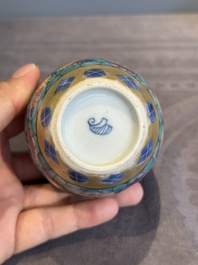 Seven Chinese blue, white and famille rose cups, six saucers and two English-decorated jarlets, Kangxi/Yongzheng