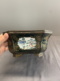 A Chinese Canton enamel gilt-decorated dark-green-ground jardini&egrave;re with four inserted plaques, Qianlong/Jiaqing