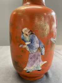 A Chinese famille rose coral-red-ground 'immortals' rouleau vase, Qianlong mark, Republic