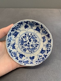 Twelve Chinese blue and white saucers and eight cups, Kangxi/Yongzheng