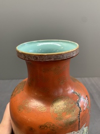 A Chinese famille rose coral-red-ground 'immortals' rouleau vase, Qianlong mark, Republic