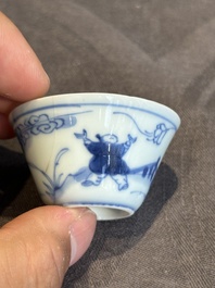 Seven Chinese blue, white and famille rose cups, six saucers and two English-decorated jarlets, Kangxi/Yongzheng