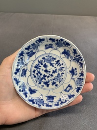 Twelve Chinese blue and white saucers and eight cups, Kangxi/Yongzheng