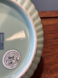 A Chinese celadon-glazed chrysanthemum-shaped plate, Qianlong mark, 20th C.