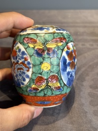 Seven Chinese blue, white and famille rose cups, six saucers and two English-decorated jarlets, Kangxi/Yongzheng