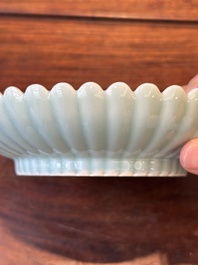 A Chinese celadon-glazed chrysanthemum-shaped plate, Qianlong mark, 20th C.