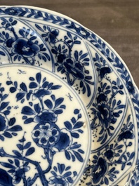 Five Chinese blue and white cups and saucers with floral design, Yu 玉 mark, Kangxi