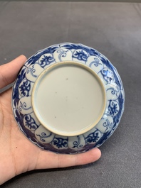 Twelve Chinese blue and white saucers and eight cups, Kangxi/Yongzheng