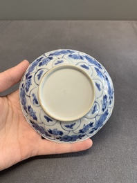 Twelve Chinese blue and white saucers and eight cups, Kangxi/Yongzheng