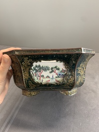 A Chinese Canton enamel gilt-decorated dark-green-ground jardini&egrave;re with four inserted plaques, Qianlong/Jiaqing