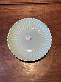 A Chinese celadon-glazed chrysanthemum-shaped plate, Qianlong mark, 20th C.