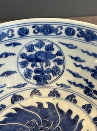 A Chinese powder blue-ground biscuit, blue and white 'Buddhist lion' bowl, Xuande mark, Kangxi