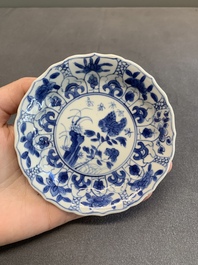 Twelve Chinese blue and white saucers and eight cups, Kangxi/Yongzheng