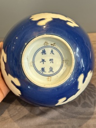 A Chinese powder blue-ground biscuit, blue and white 'Buddhist lion' bowl, Xuande mark, Kangxi