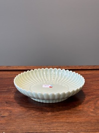 A Chinese celadon-glazed chrysanthemum-shaped plate, Qianlong mark, 20th C.