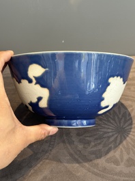 A Chinese powder blue-ground biscuit, blue and white 'Buddhist lion' bowl, Xuande mark, Kangxi