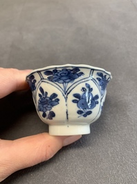 Twelve Chinese blue and white saucers and eight cups, Kangxi/Yongzheng