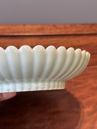 A Chinese celadon-glazed chrysanthemum-shaped plate, Qianlong mark, 20th C.