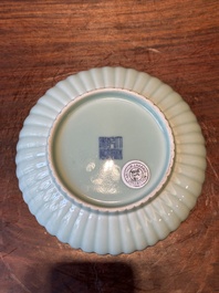 A Chinese celadon-glazed chrysanthemum-shaped plate, Qianlong mark, 20th C.