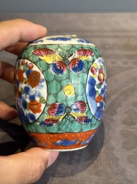 Seven Chinese blue, white and famille rose cups, six saucers and two English-decorated jarlets, Kangxi/Yongzheng