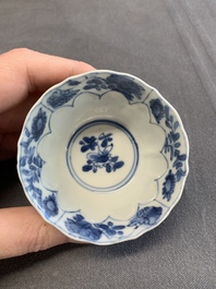 Twelve Chinese blue and white saucers and eight cups, Kangxi/Yongzheng