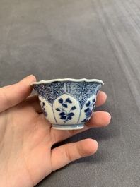 Twelve Chinese blue and white saucers and eight cups, Kangxi/Yongzheng