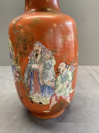 A Chinese famille rose coral-red-ground 'immortals' rouleau vase, Qianlong mark, Republic
