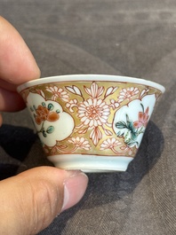 Seven Chinese blue, white and famille rose cups, six saucers and two English-decorated jarlets, Kangxi/Yongzheng